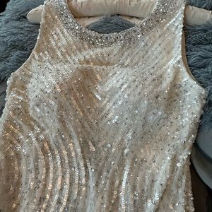 Cream colored Full length beaded gown by Aidan Mattox